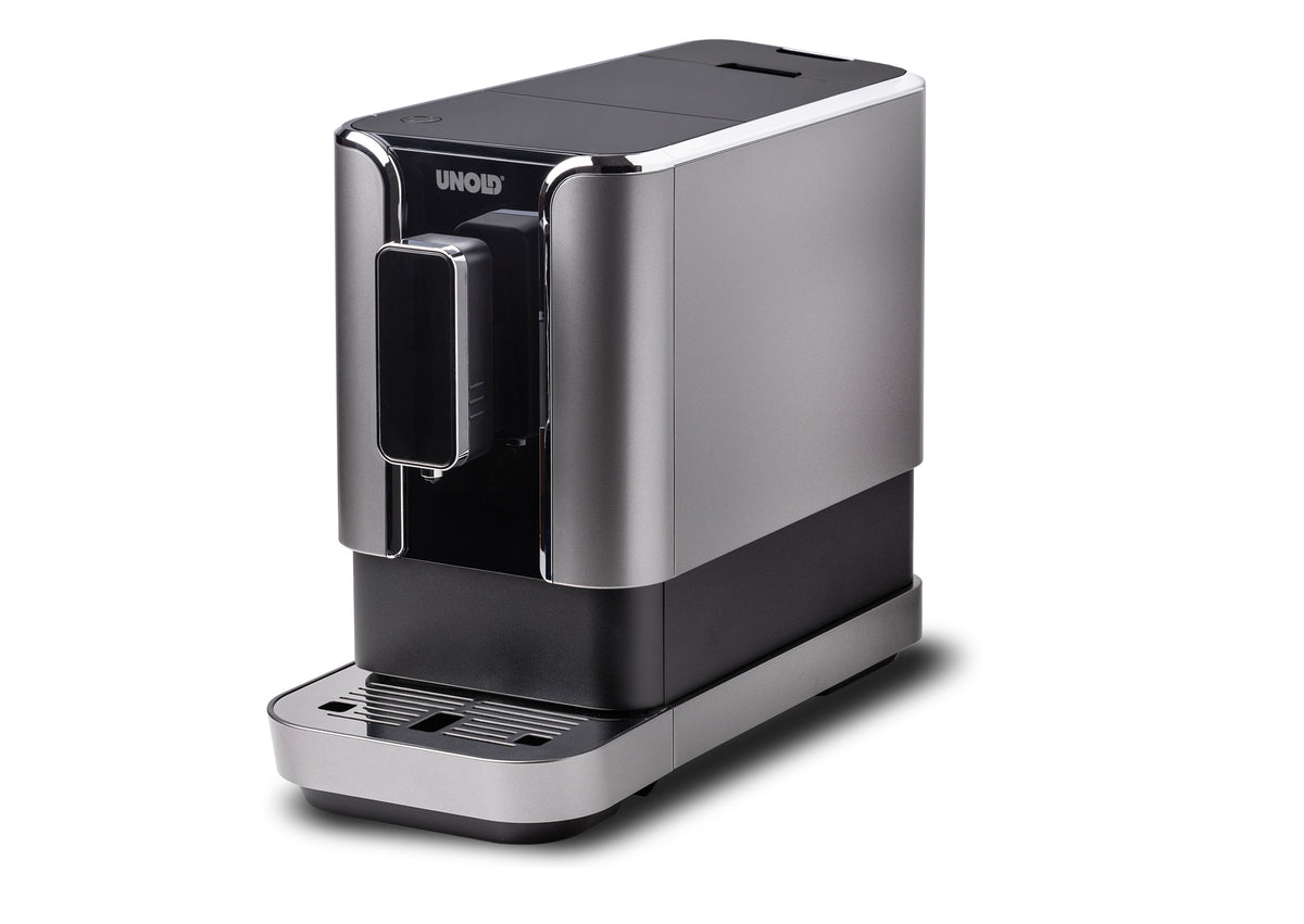 Der Unold Kaffeevollautomat LUCA ist ein moderner Kaffeevollautomat in Silber und Schwarz mit elegantem Design, einem Frontauslauf, einer Tropfschale und dem Unold-Branding auf der oberen Frontplatte vor weißem Hintergrund.