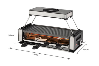 Das Unold Raclette Smokeless inklusive Raclette Buch ist ein rechteckiger Elektrogrill (49 cm breit, 28,2 cm hoch, 20,4 cm tief) mit einer oberen Grillfläche, Minischalen darunter und einem Bedienknopf auf der rechten Seite.