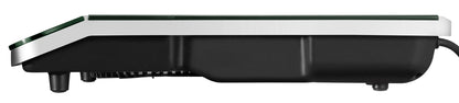 Seitenansicht der Unold AG Einzel-Induktionskochplatte - Schwarz/Edelstahl 581051 (B-Ware), ein schlankes, modernes Induktionskochfeld mit schlankem schwarzem Sockel, Edelstahlverkleidung, dunkler Glasplatte, kleinen Füßen und sichtbarem Netzkabel auf der rechten Seite.