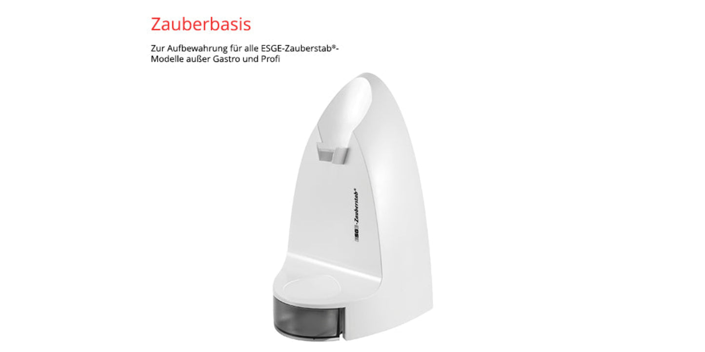 Die Unold ESGE-Zauberstab® M 200 Superbox verfügt über einen weißen Standfuß (nicht für Gastro/Profi-Modelle) mit Einschub für den Stabmixer und einem kleinen Bodenfach. Oberhalb des Produkts im Bild ist deutscher Text sichtbar.