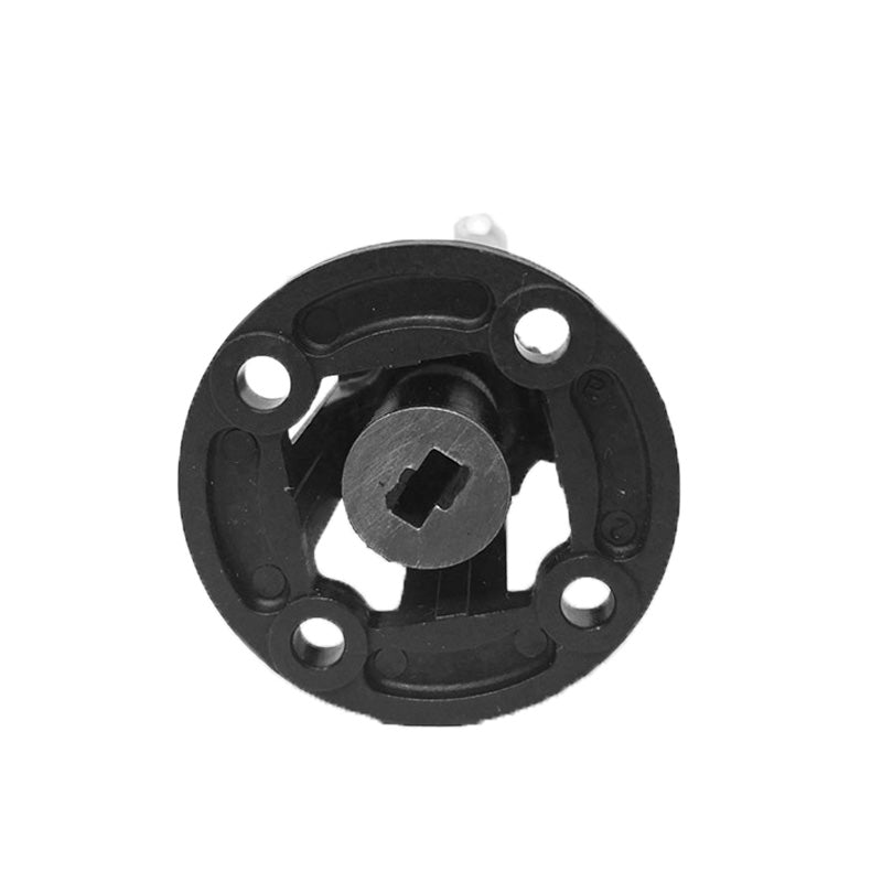 Der Unold Abtrieb komplett zu M100-M200, SG2000 & M250 ist ein schwarzes, rundes Bauteil mit vier gleichmäßig verteilten Löchern und einer zentralen Metallwelle mit rechteckigem Schlitz, von vorne auf weißem Hintergrund dargestellt.