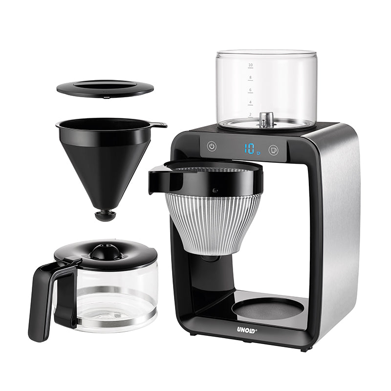 Der Unold Kaffeeautomat Aroma Star verfügt über einen durchsichtigen Wasserbehälter oben, einen schwarzen trichterförmigen Filterhalter, eine Glaskaraffe mit schwarzem Griff und Deckel sowie eine Haupteinheit mit Digitalanzeige – alle Teile sind der Übersichtlichkeit halber separat dargestellt.