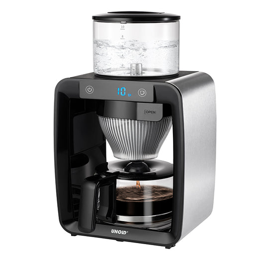 Der Unold Kaffeeautomat Aroma Star ist eine moderne elektrische Kaffeemaschine mit Digitalanzeige, Glaswassertank oben, Glaskanne darunter und einem Gehäuse aus schwarzem Edelstahl, abgebildet beim Kaffeekochen.