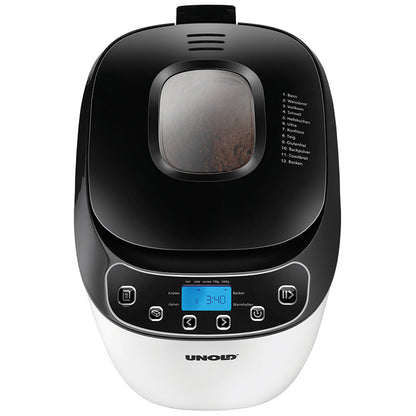 Der Unold 68010 Backmeister® Design ist ein schwarz-weißer Brotbackautomat mit Digitalanzeige, Bedientasten, Sichtfenster mit Blick auf das Brot im Inneren und auf dem Deckel aufgelisteten Backprogrammen.