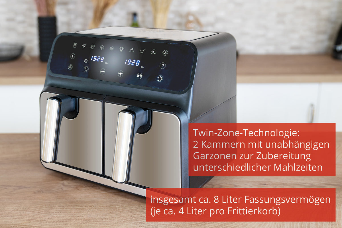 Die Unold Heißluftfritteuse Doppelkammer Twin Zone mit Twin-Zone-Technologie und zwei 4-Liter-Fächern (insgesamt 8 l) steht auf einer Küchentheke aus Holz.