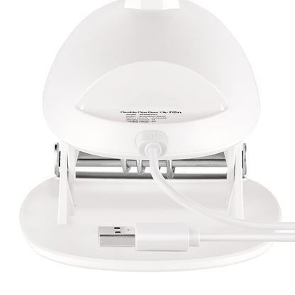Eine Nahaufnahme des Unold TISCHVENTILATOR BREEZY CLIP zeigt seine Rückansicht mit dem integrierten USB-Kabel und dem Stecker, der mit dem Ventilator verbunden ist und aus dem kompakten weißen elektronischen Gerät herausragt.